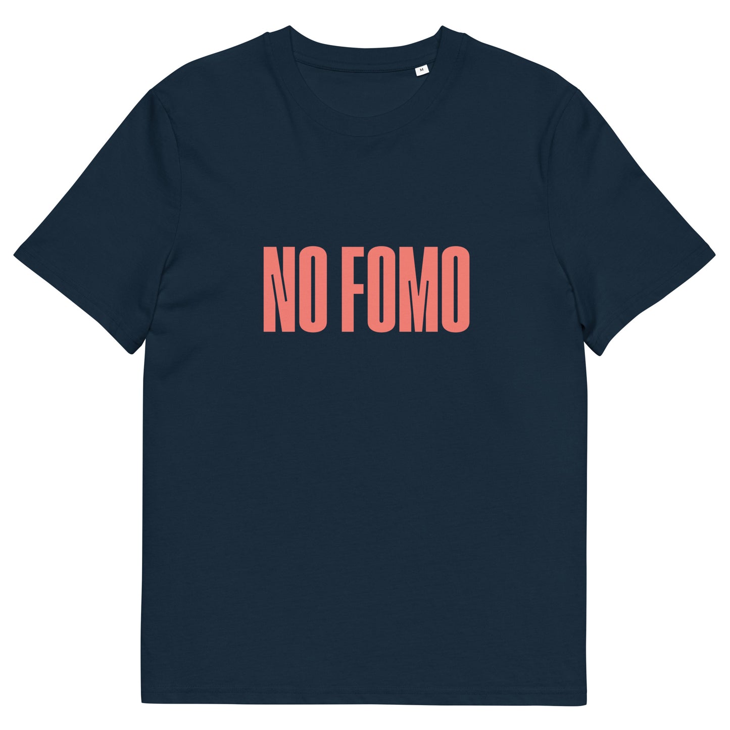 Man wearing navy blue t-shirt with bold red text “NO FOMO,” styled with olive green pants and a black cap