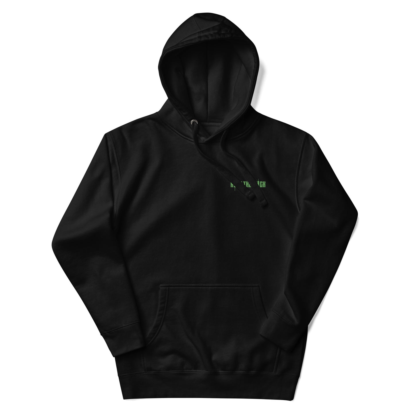 Woman wearing oversized black hoodie with small green chest text that reads “Ride the Wave,” styled with black joggers